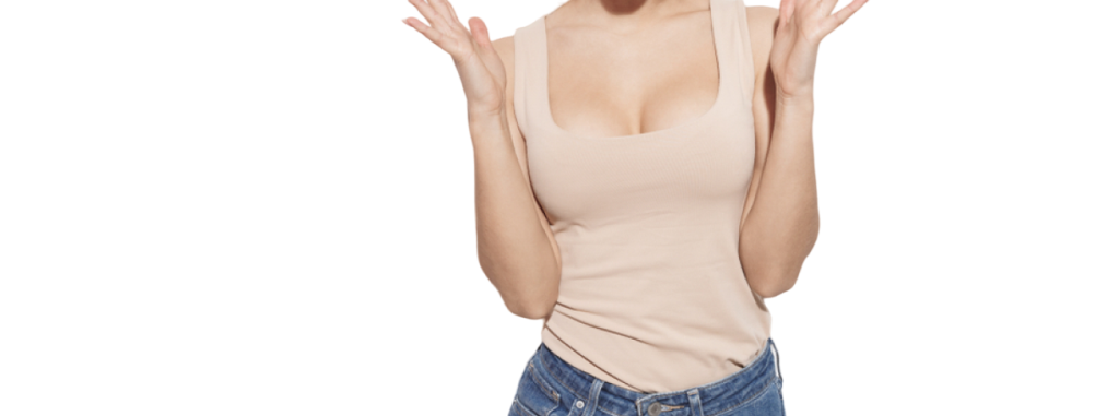 a woman in a tank top is holding her hands up.