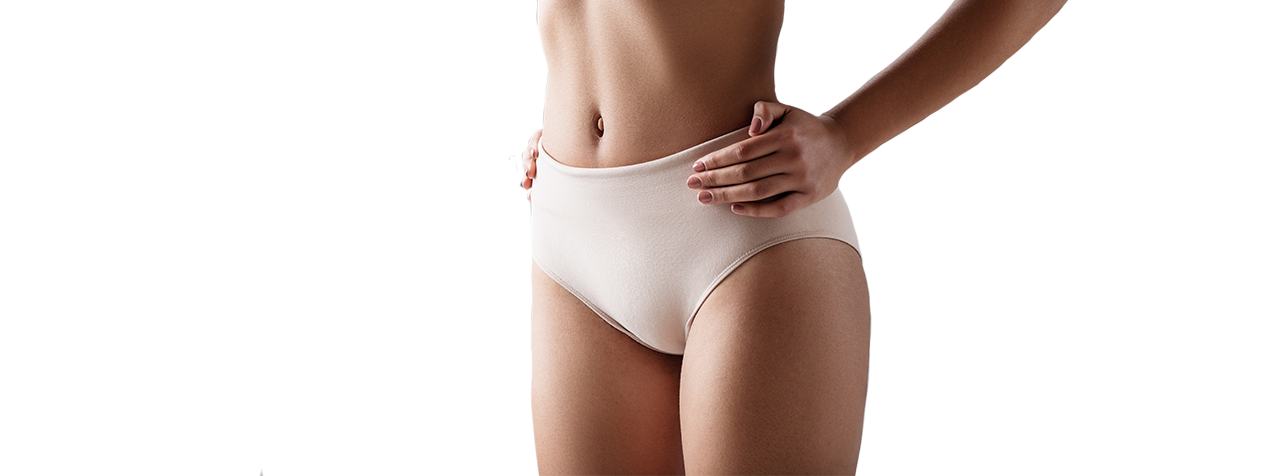 a woman in a white underwear with her hands on her hips.