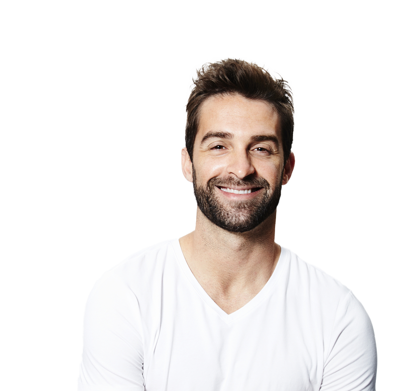 A man with a beard smiling on a white background.